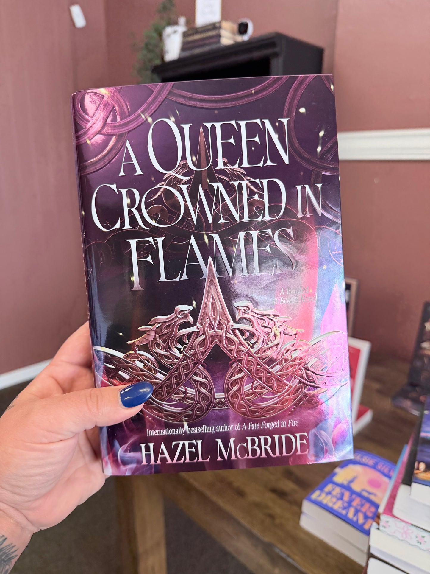 A Queen Crowned in Flames: A Bonded to Beasts Novel by Hazel McBride